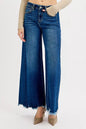 Dark wash RISEN plus size high-rise ankle wide jeans from Trendsi, showcasing the relaxed fit and stylish design.
