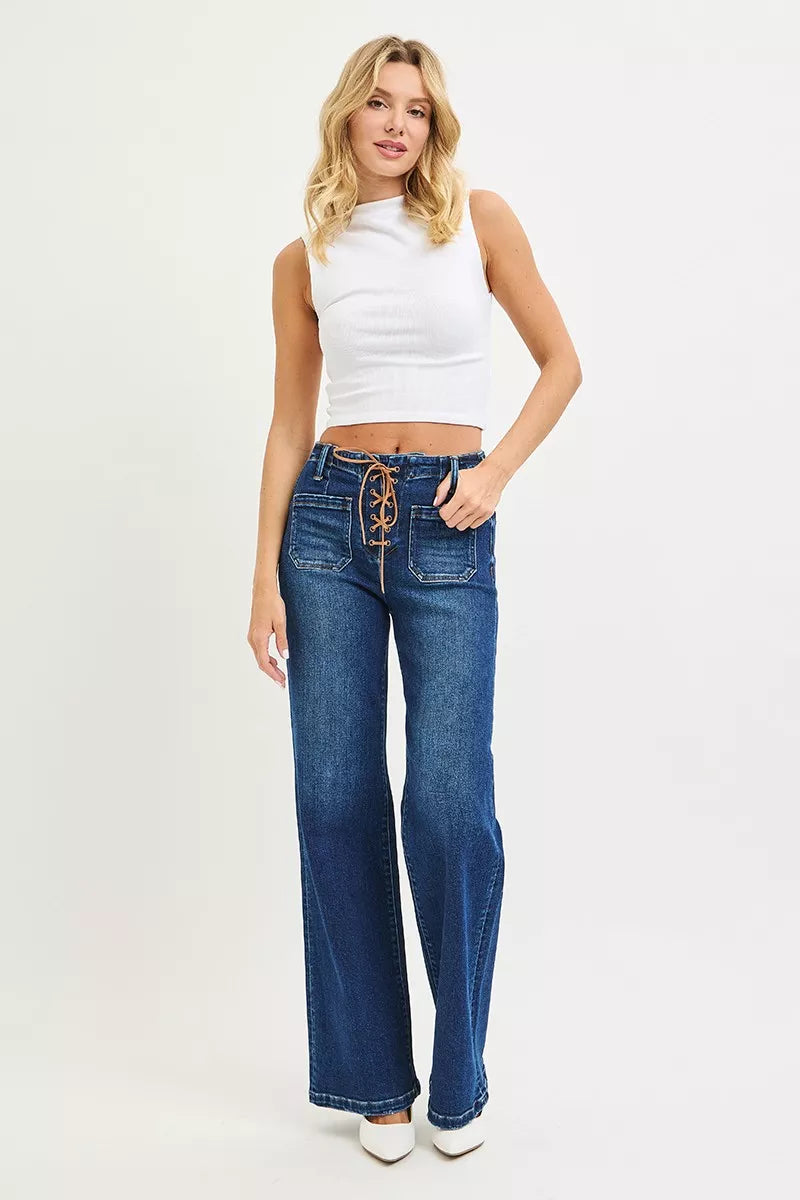 Dark wash Risen high-rise wide leg jeans with front tie detail, plus size, by Trendsi, shown on a model.