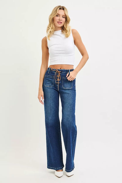 Dark wash Risen high-rise wide leg jeans with front tie detail, plus size, by Trendsi, shown on a model.