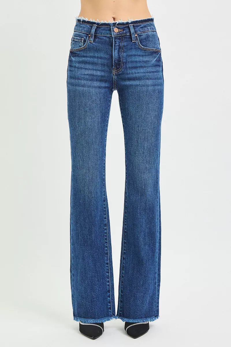 Dark wash Risen plus size bootcut jeans with mid-rise fit, frayed waistband, and hem detail from Trendsi.