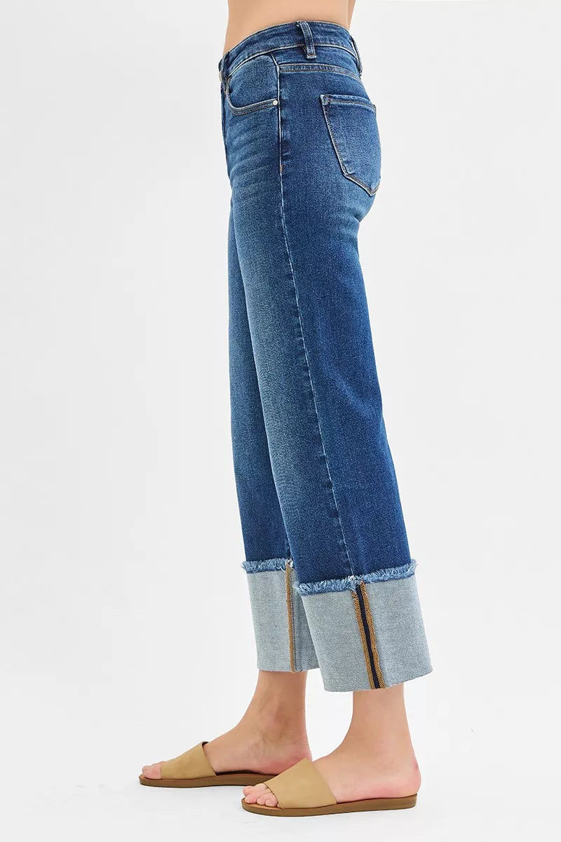 Dark blue RISEN plus size mid-rise crop wide cuffed jeans with a relaxed fit and stylish wide leg design.