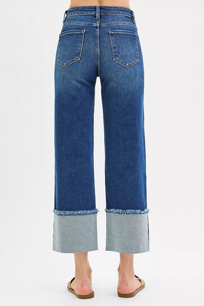 Dark wash Risen full size mid-rise crop wide cuffed jeans by Trendsi, featuring a relaxed fit and wide cuffed hem for plus size.