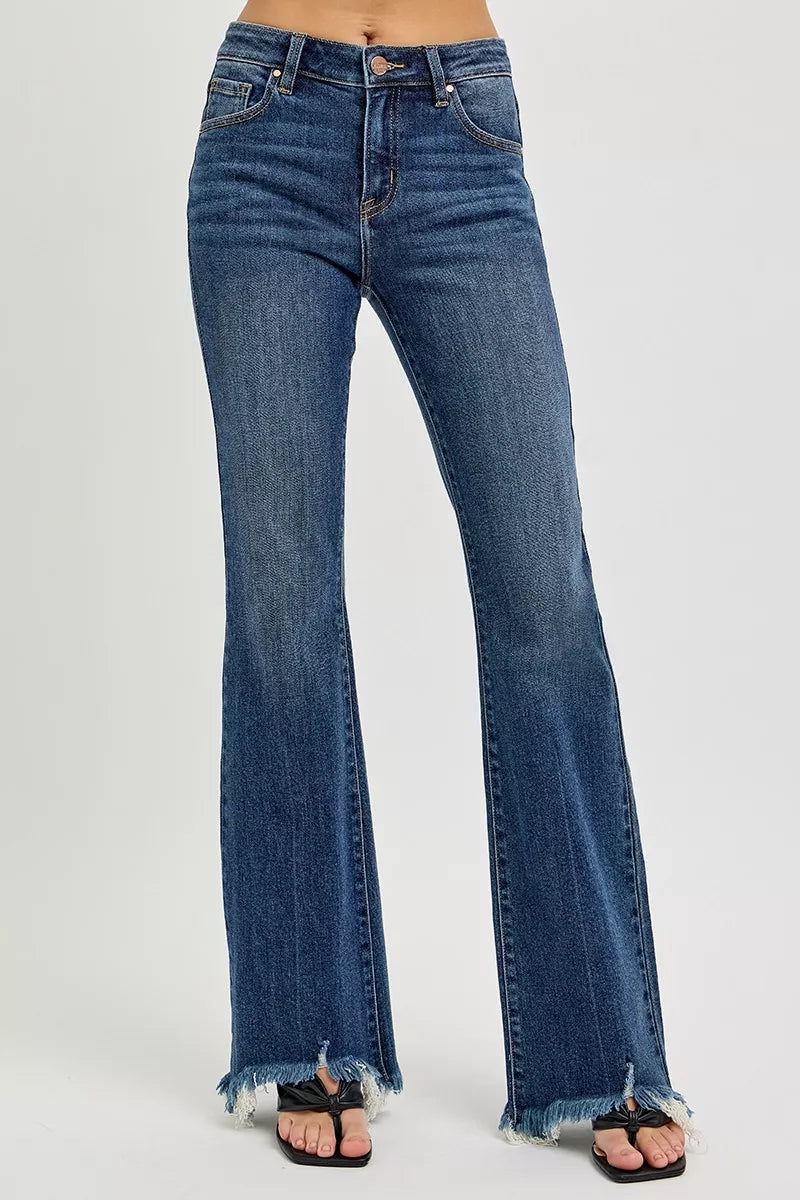 Dark wash plus size RISEN mid-rise flare jeans with frayed hem, full length, trendy denim from Trendsi.