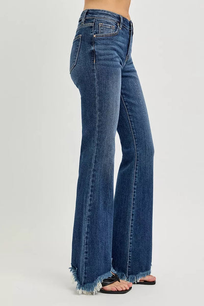 Dark wash RISEN full-size mid-rise flare jeans with frayed hem, plus size trendy denim from Trendsi.