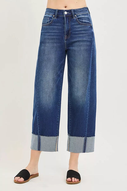 Dark denim RISEN full size slouchy crop barrel cuff jeans by Trendsi, featuring a relaxed fit and stylish rolled cuffs.