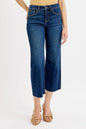 Dark wash Risen plus size high rise crop wide jeans with tummy control and full size fit, displayed on a hanger.