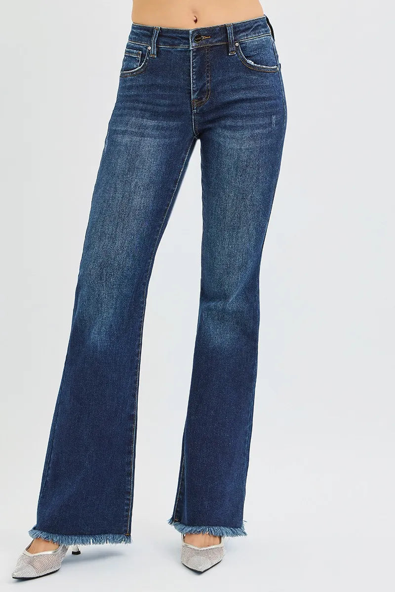 Plus size dark wash RISEN flare jeans with tummy control, mid-rise fit, and stylish silhouette from Trendsi.