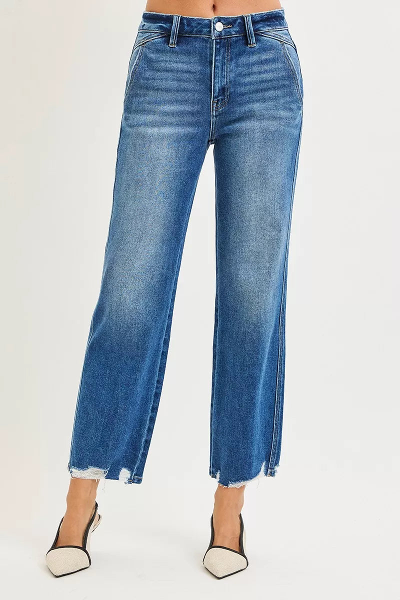 Dark blue Risen high-rise ankle straight jeans with distressed hem and classic denim texture.