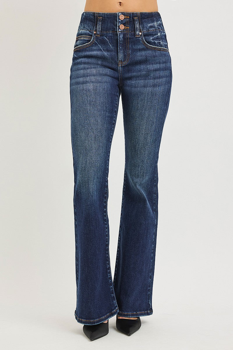 Dark wash Risen high-rise flare jeans with seam detail on waistband, showcasing a stylish and figure-flattering fit.