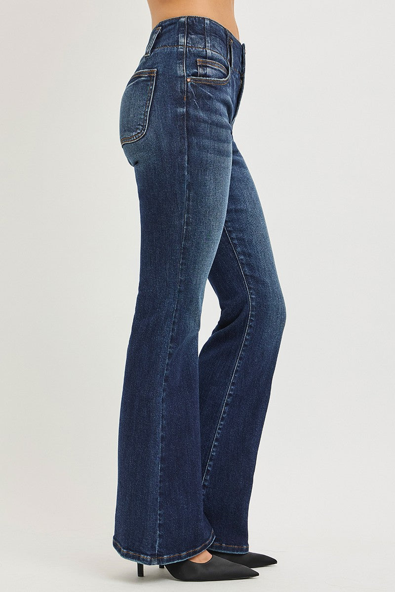 Dark wash Risen high-rise flare jeans with seam detail and wide waistband, showcasing a stylish, fitted denim look.