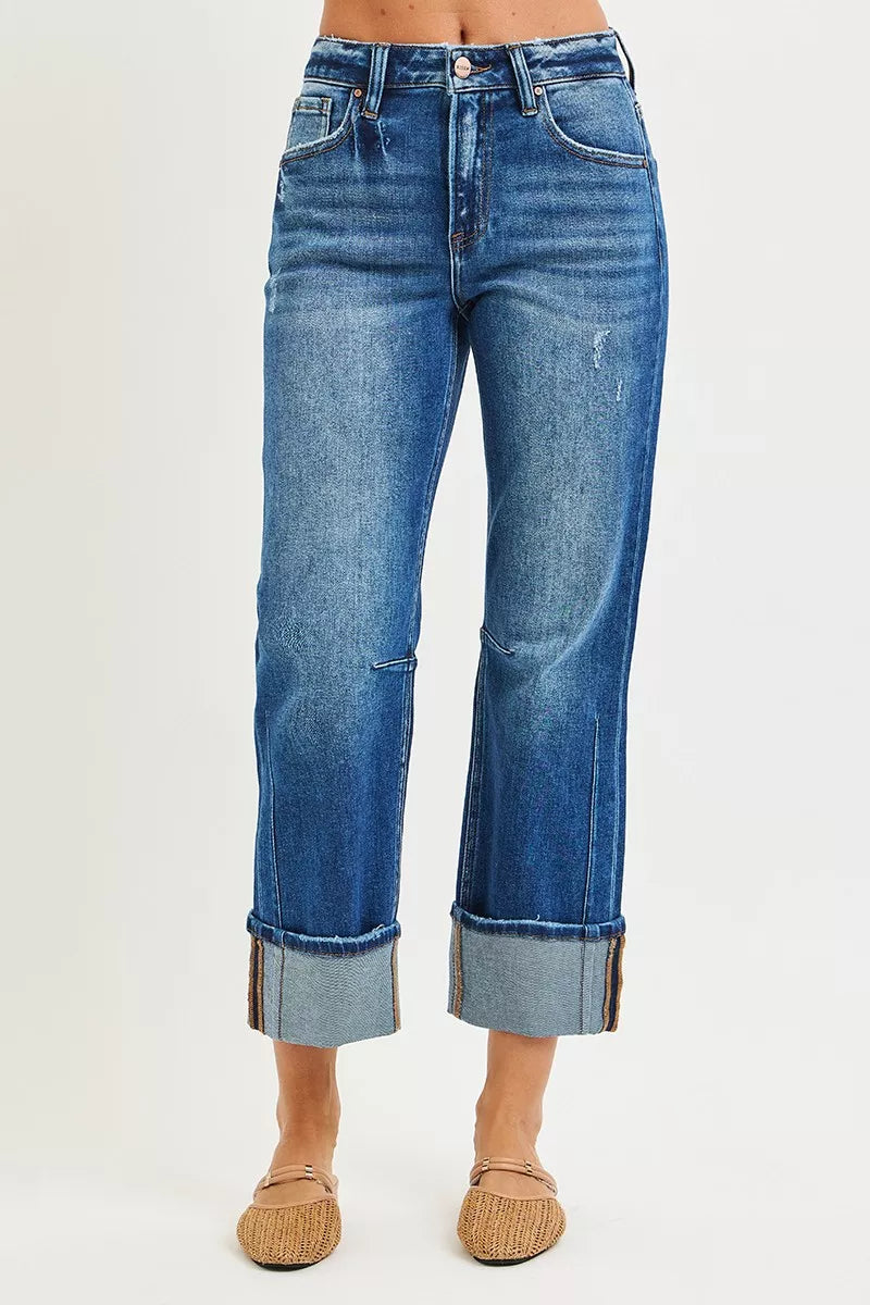 Dark Risen high-rise straight jeans with distressed hem, trendy denim from Trendsi, styled for a casual, modern look.