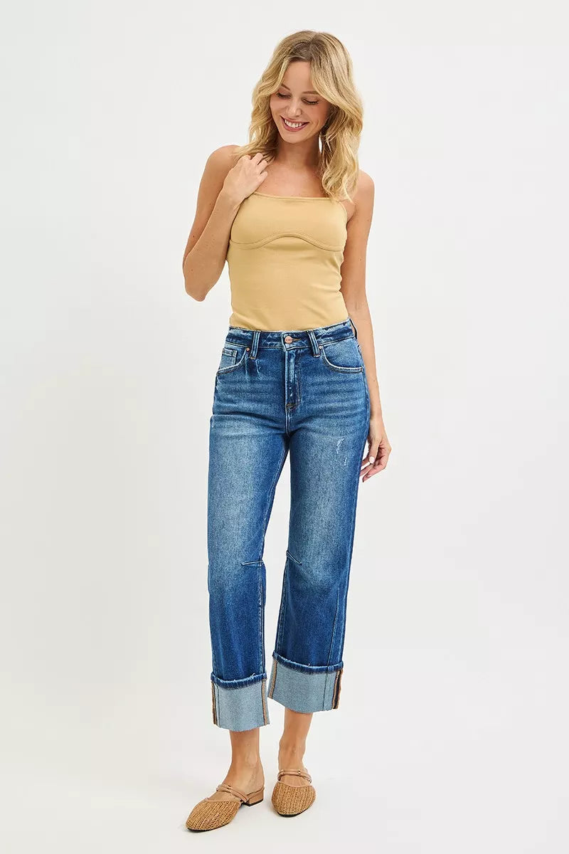 Dark Risen high-rise straight jeans with distressed hem by Trendsi, showing front view with fitted waistband and casual style.