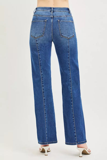 Dark wash RISEN high-rise straight jeans with patch pockets and seamed details, showcasing classic denim style.