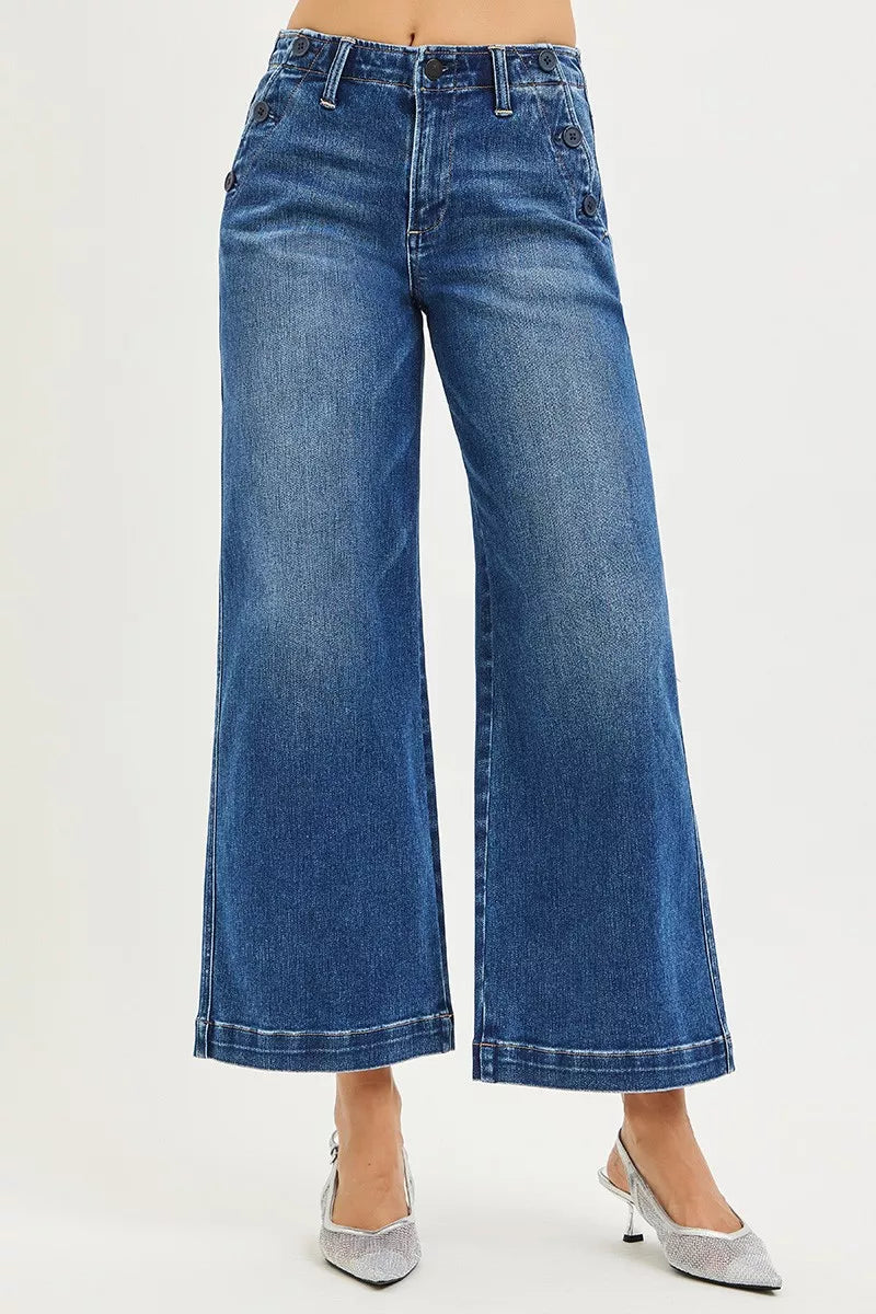 Dark wash Risen high-rise wide-leg jeans with front pockets and button details, stylish denim from Trendsi.