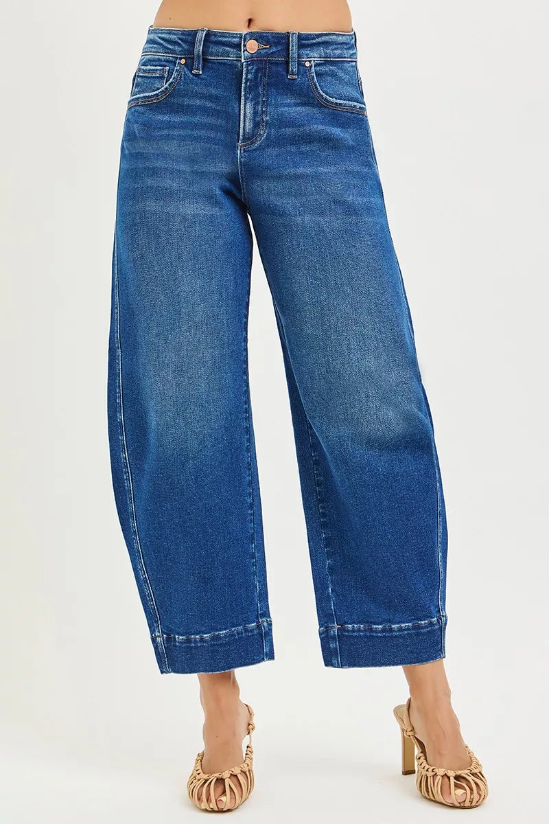 Dark wash RISEN mid-rise crop barrel jeans from Trendsi, featuring a classic five-pocket design and relaxed fit.