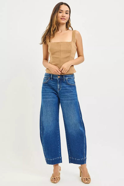Dark blue Risen Mid Rise Crop Barrel Jeans by Trendsi, showing the fitted waist, cropped length, and relaxed barrel leg style.