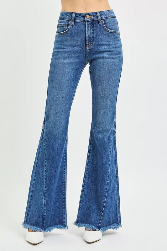 Dark wash RISEN mid-rise flare jeans with side seam detailing and classic five-pocket design, stylish and comfortable for casual wear.