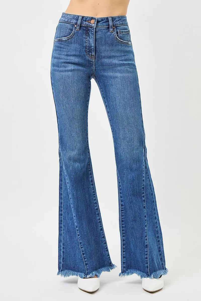 Dark wash RISEN mid-rise flare jeans with side seam detailing, stylish and fitted, by Trendsi, perfect for casual and trendy looks.