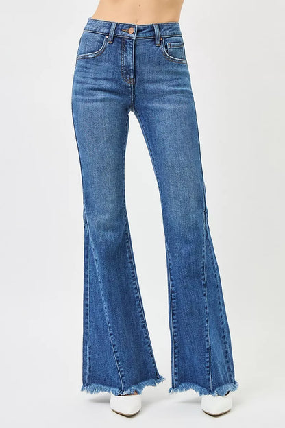 Dark wash RISEN mid-rise flare jeans with side seam detailing, stylish and fitted, by Trendsi, perfect for casual and trendy looks.