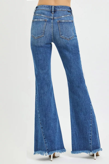 Dark wash Risen mid-rise flare jeans with side seam detailing, featuring a trendy and flattering silhouette from Trendsi.