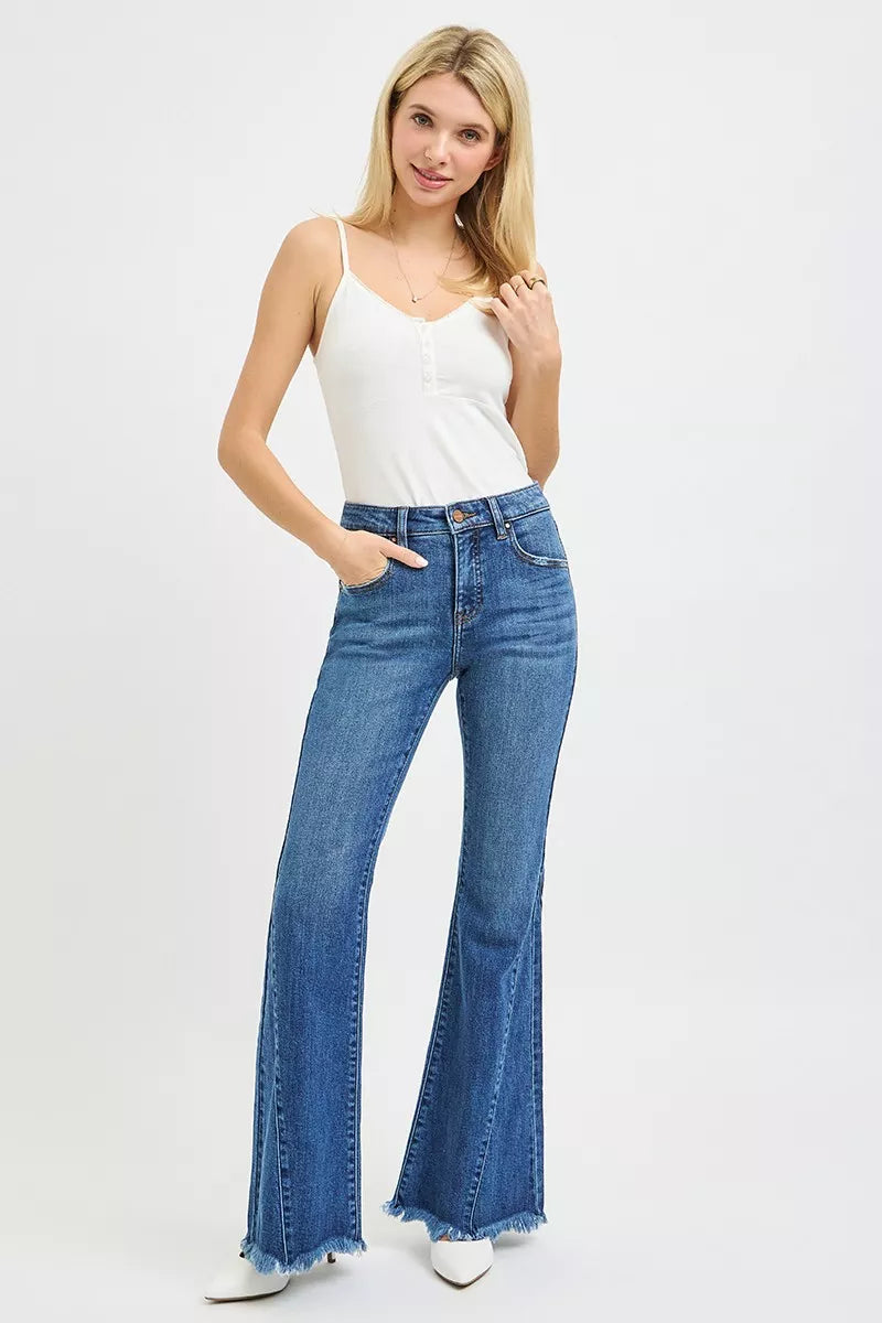Dark blue RISEN mid-rise flare jeans with side seam detailing, stylish and fitted for a trendy casual look.