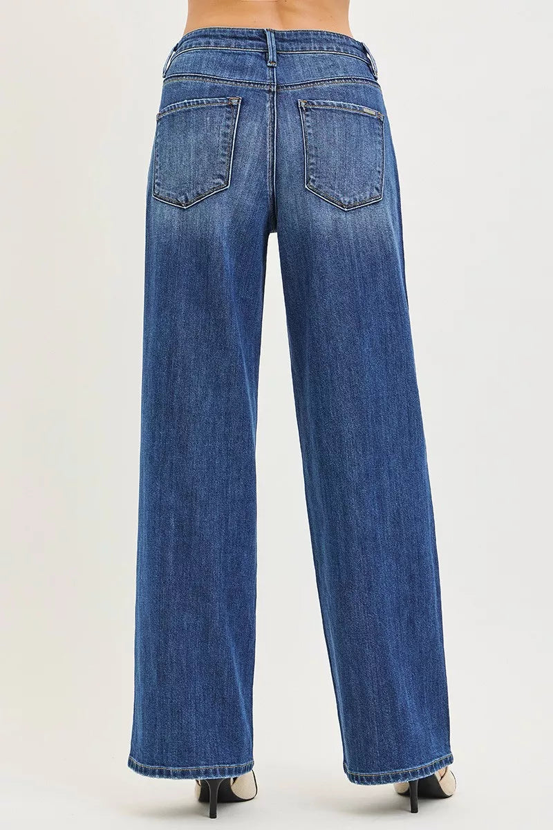 Dark RISEN slouchy baggy jeans with side and back pockets, relaxed fit, trendy casual style from Trendsi.