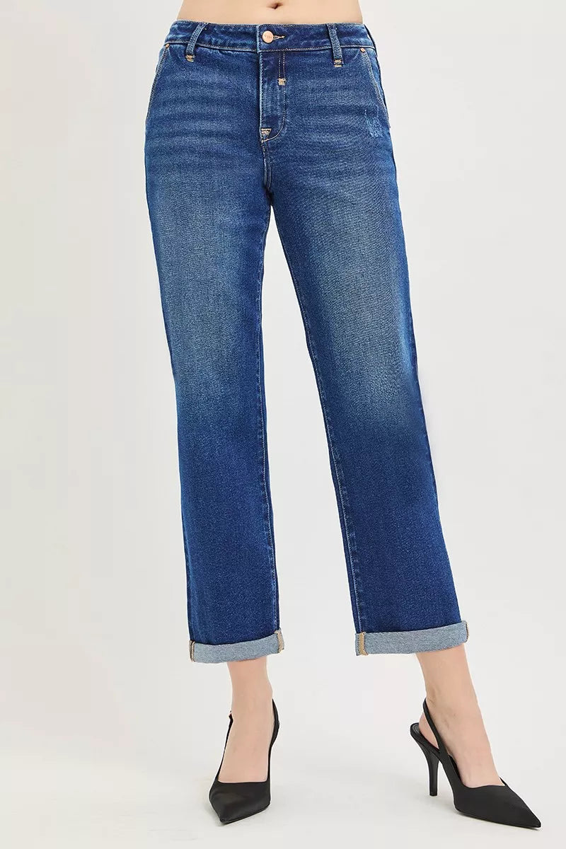 Dark RISEN slouchy cropped boyfriend jeans with cuffed hem, relaxed fit, and distressed details, styled casually.