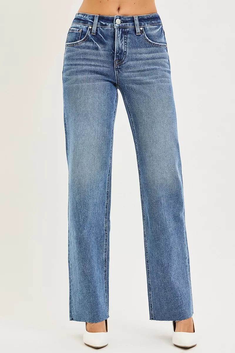 Dark blue Risen Tummy Control straight jeans by Trendsi, mid-rise with 4-way stretch and a slim fit, shown on a model.