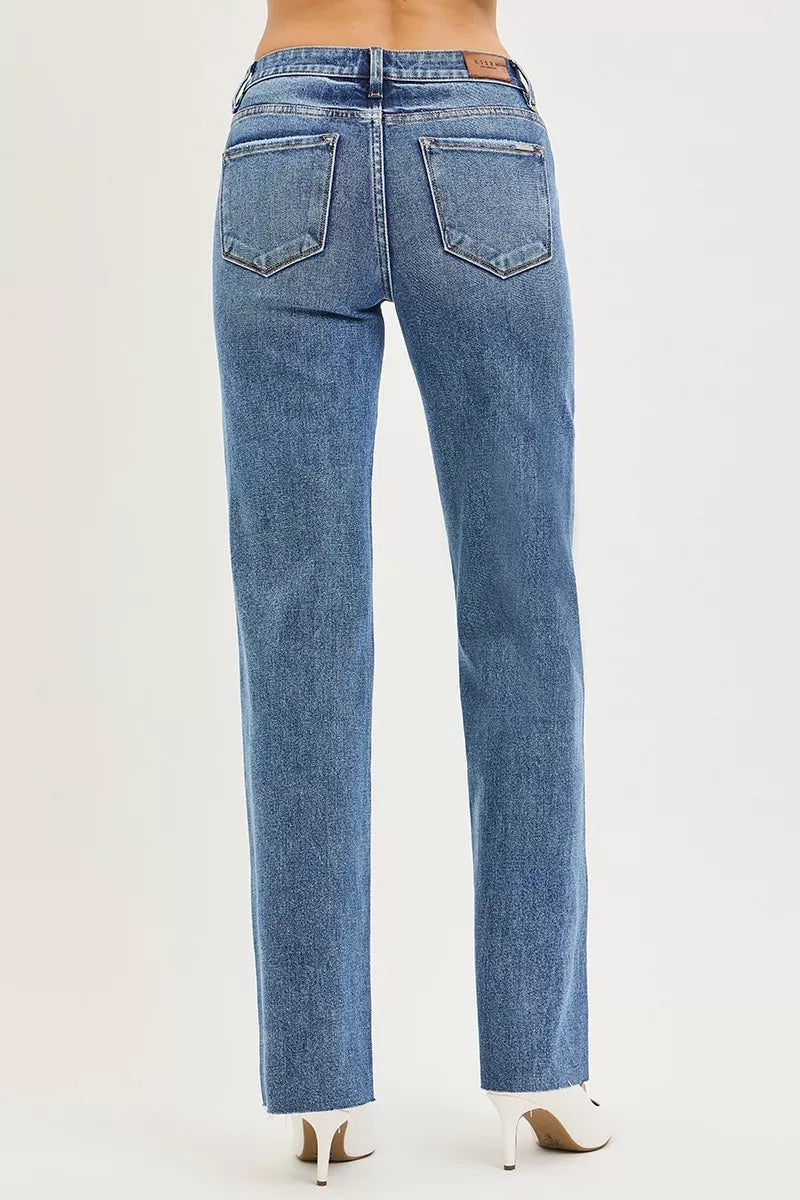 Dark wash Risen Tummy Control 4-Way Stretch Mid-Rise Straight Jeans with comfortable fit and classic style.