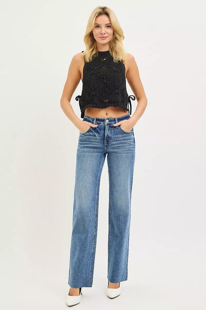 Dark blue RISEN Tummy Control 4-Way Stretch Mid-Rise Straight Jeans from Trendsi, showing the fit and classic denim style.