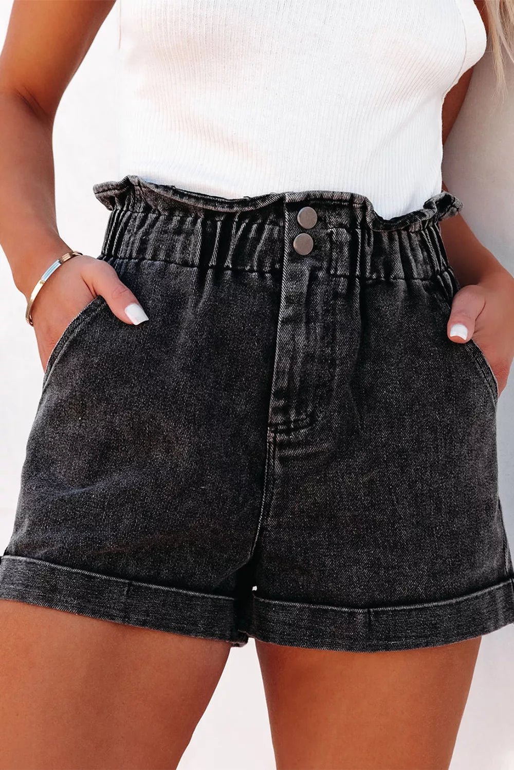 Dark blue paperbag waist denim shorts with front and back pockets, casual stylish look from Trendsi.