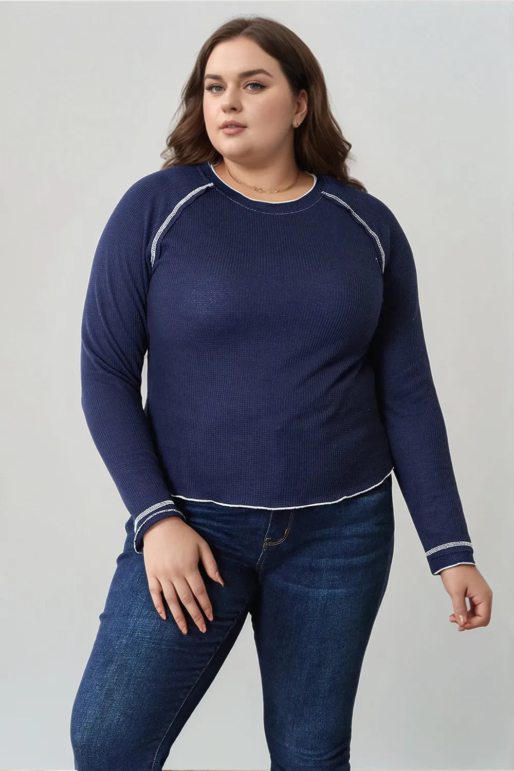 Dark blue Basic Bae long raglan sleeve round neck top by Trendsi, casual women's shirt with relaxed fit and soft fabric.