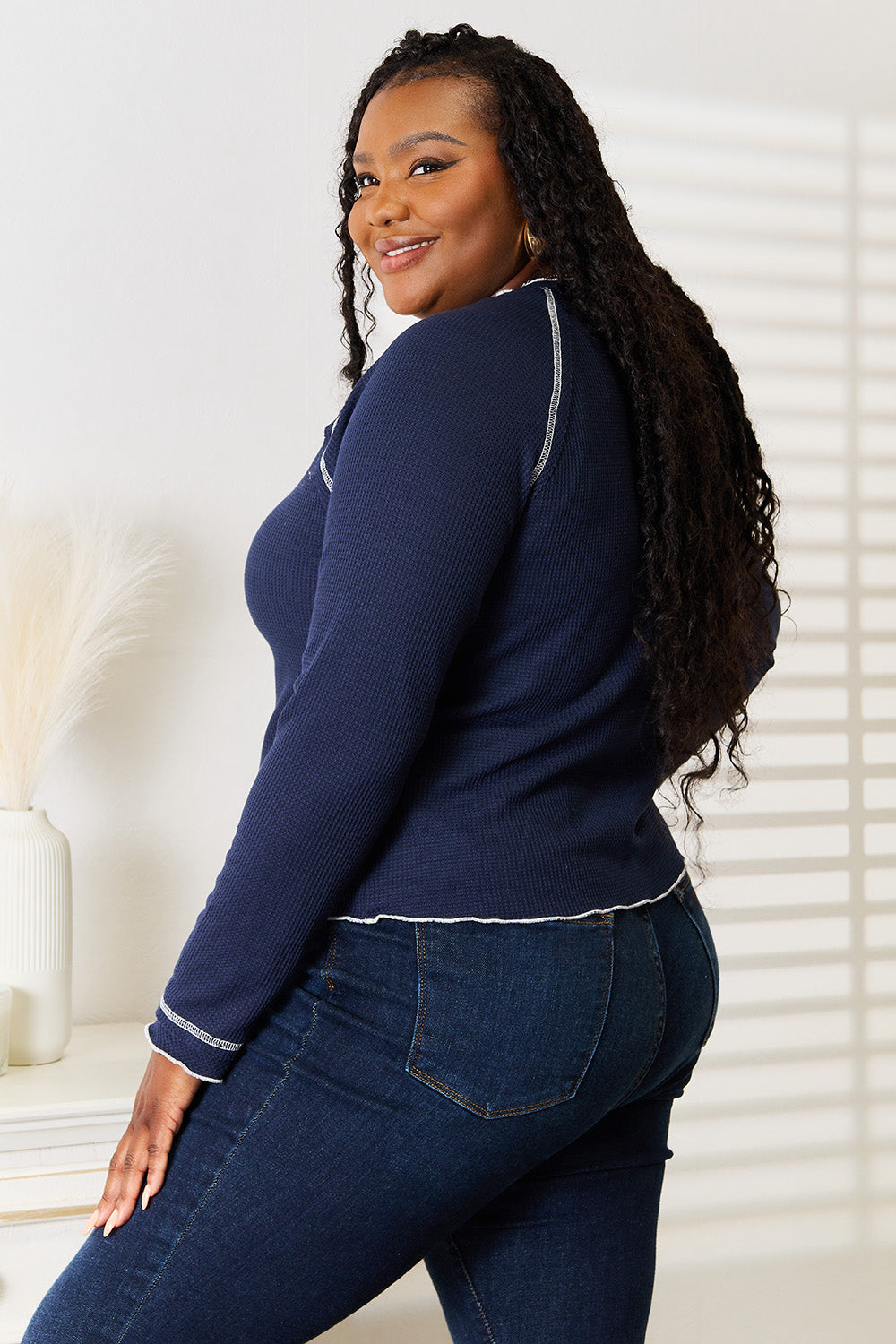 Dark blue Basic Bae long raglan sleeve round neck top by Trendsi, featuring a casual fit and comfortable fabric.