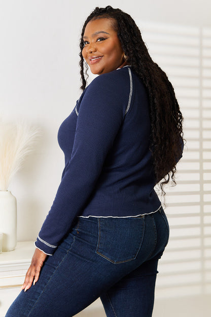 Dark blue Basic Bae long raglan sleeve round neck top by Trendsi, featuring a casual fit and comfortable fabric.