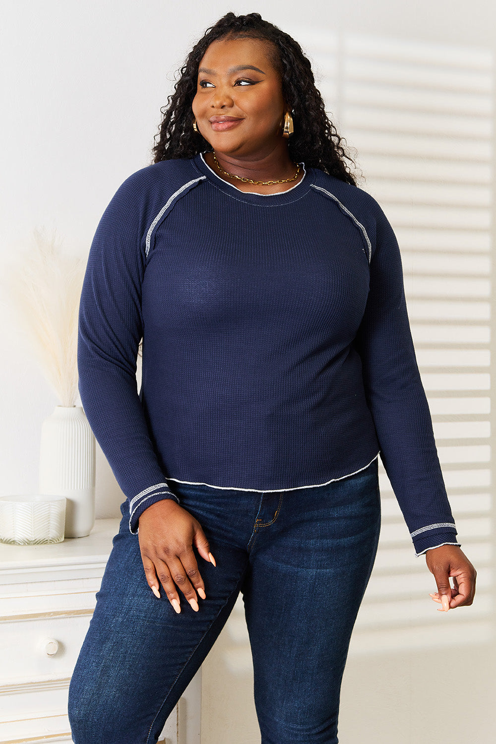 Dark blue Basic Bae long raglan sleeve round neck top by Trendsi, casual women's knit shirt with relaxed fit.
