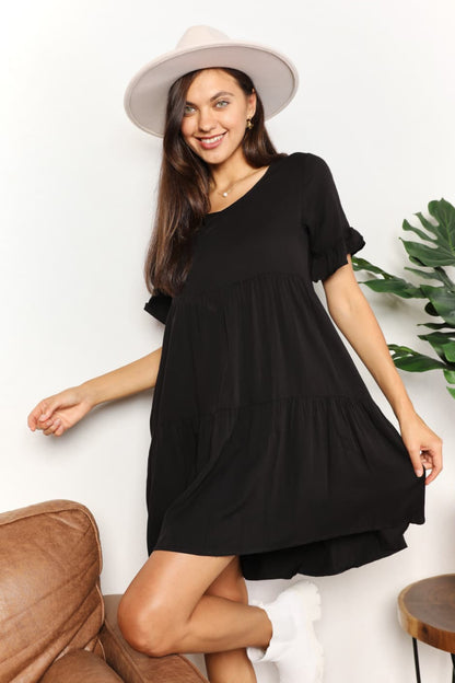 Dark blue Mandy V-Neck Flounce Sleeve Tiered Dress by Trendsi, featuring a stylish V-neck and layered tiered skirt.