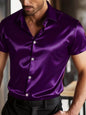 Dark blue men's satin short sleeve shirt in plus size from Trendsi, featuring a smooth, shiny fabric and relaxed fit.