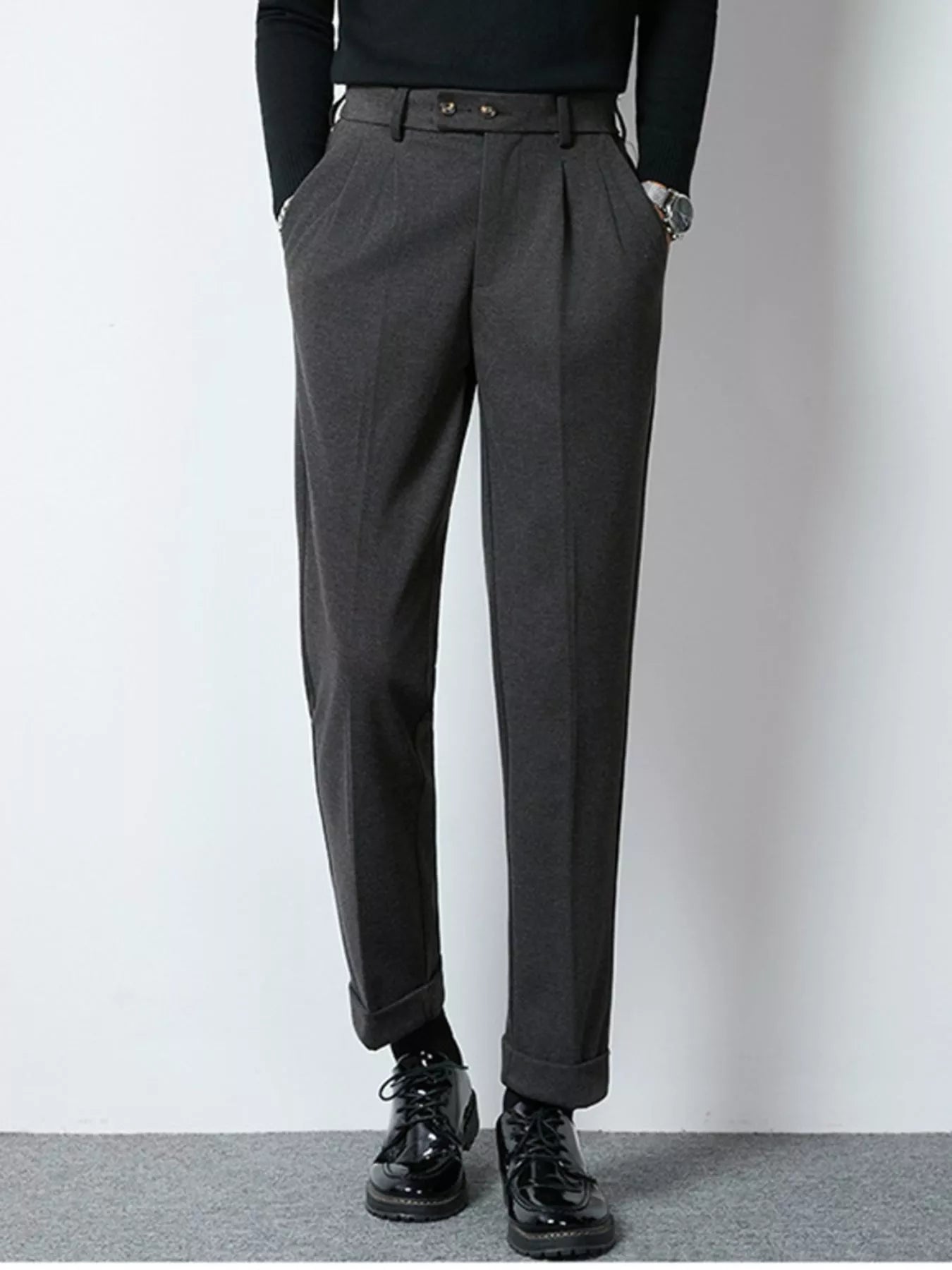 Dark gray men's pleated dress pants by Trendsi, tailored fit with classic pleats and side pockets, suitable for formal occasions.