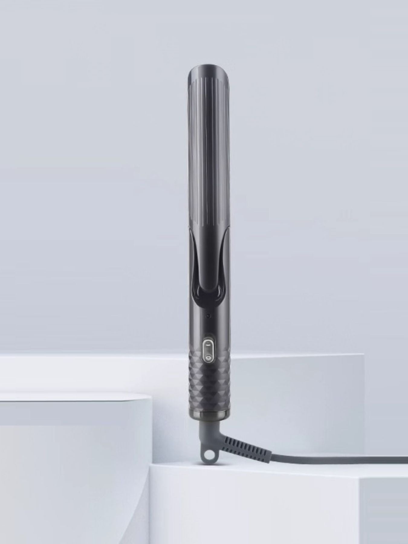 Dark gray Trendsi fast heating curling iron with European plug, showcasing its sleek design and professional styling features.