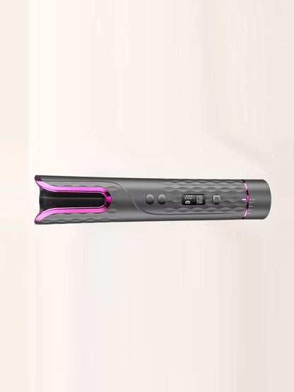 Dark gray automatic rotating ceramic hair curling iron by Trendsi, showcasing its sleek design and rotating barrel for styling.