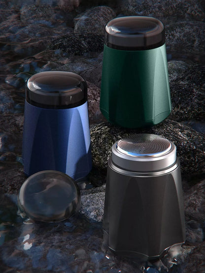 Dark gray portable mini electric shaver by Trendsi, compact design with a sleek finish, ideal for travel grooming.
