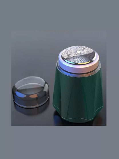 Dark gray portable mini electric shaver by Trendsi, compact design ideal for travel and quick grooming.