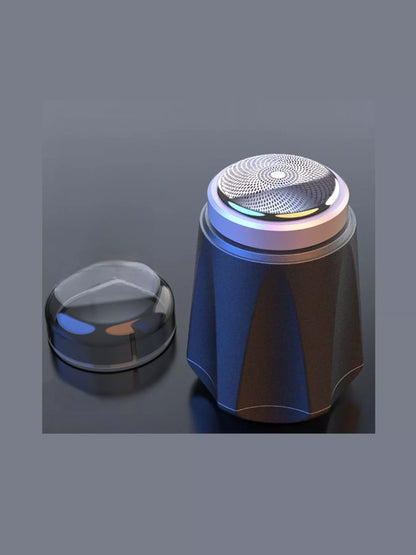 Dark gray portable mini electric shaver by Trendsi with compact design and ergonomic grip for easy grooming.