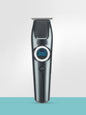 Dark gray cordless hair clipper from Trendsi with LED display and adjustable blades, designed for precise hair cutting.