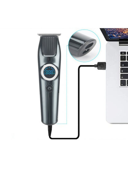 Dark gray cordless hair clipper with LED display and adjustable blades, designed for precise hair cutting.