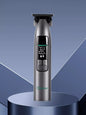 Dark gray cordless hair clipper with LED display from Trendsi, featuring a sleek design and adjustable blades for precise grooming.