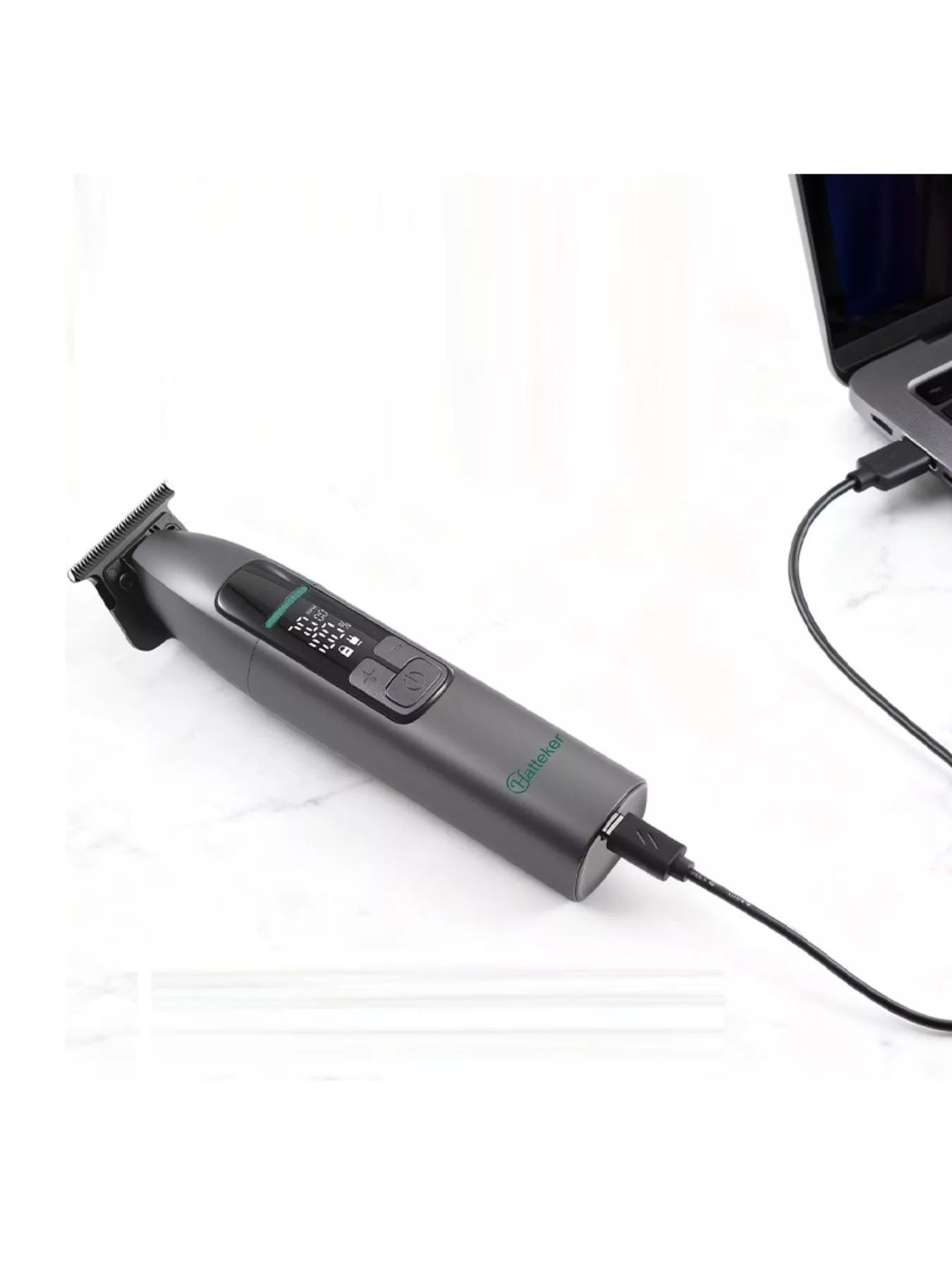 Dark gray cordless hair clipper with LED display, Trendsi brand, showcasing its compact design and adjustable blades.