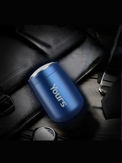 Dark gray portable mini electric shaver by Trendsi, compact design ideal for travel and quick grooming.