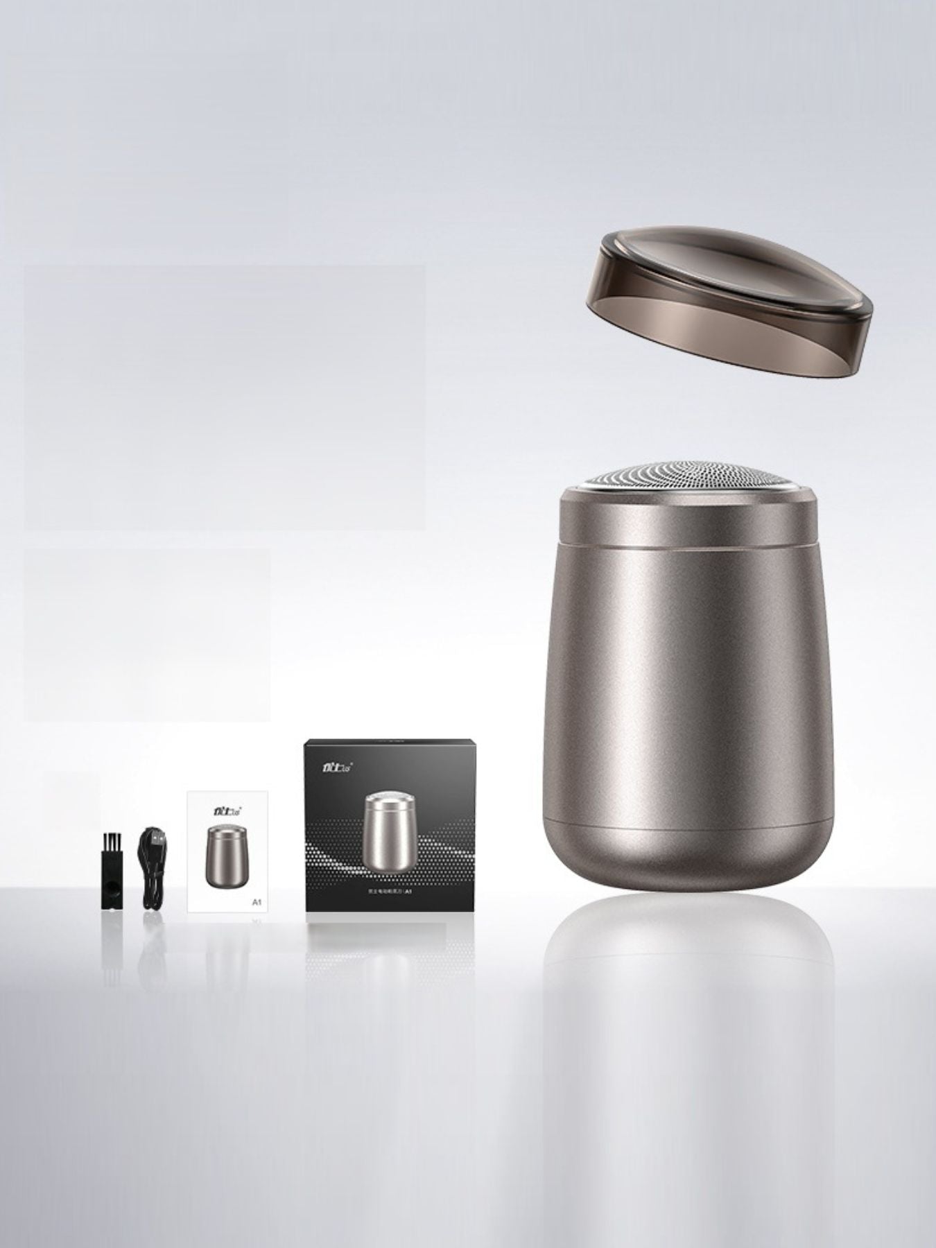 Dark gray portable mini electric shaver by Trendsi, compact design with a sleek, ergonomic body for easy handling.
