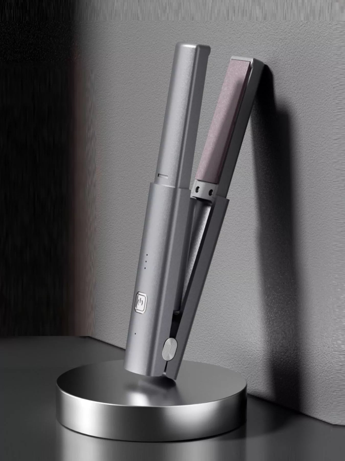 Dark gray portable rechargeable hair straightener by Trendsi, compact and lightweight for on-the-go styling.